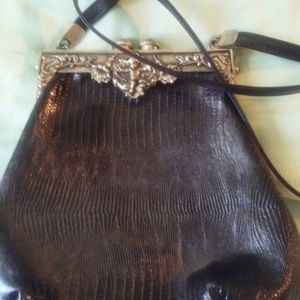 Vintage Moulin Rouge leather handbag with cherubs